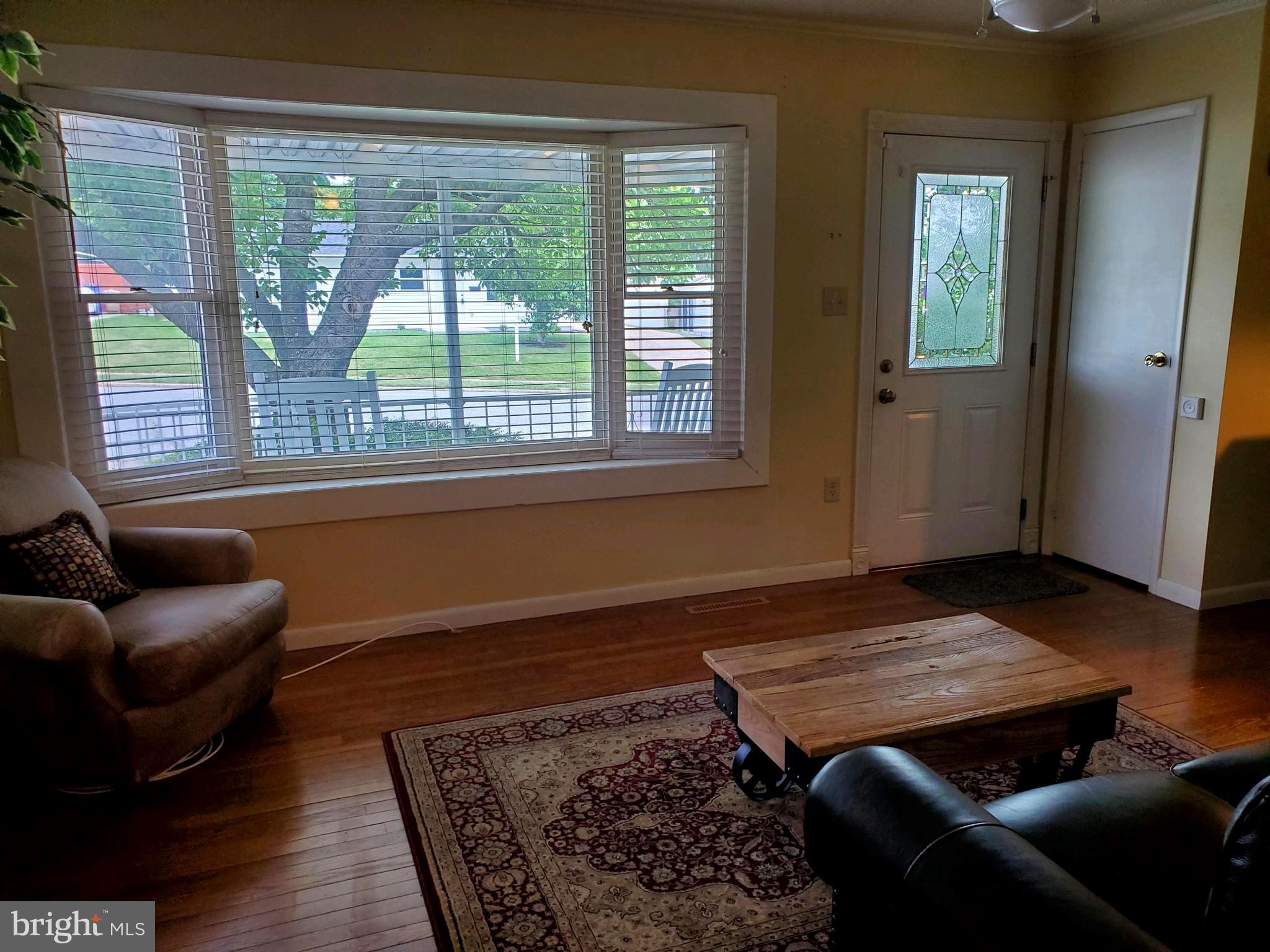 316 Queen Street Frederick, MD 21701 - Photo 14 of 28 Living room with bay window