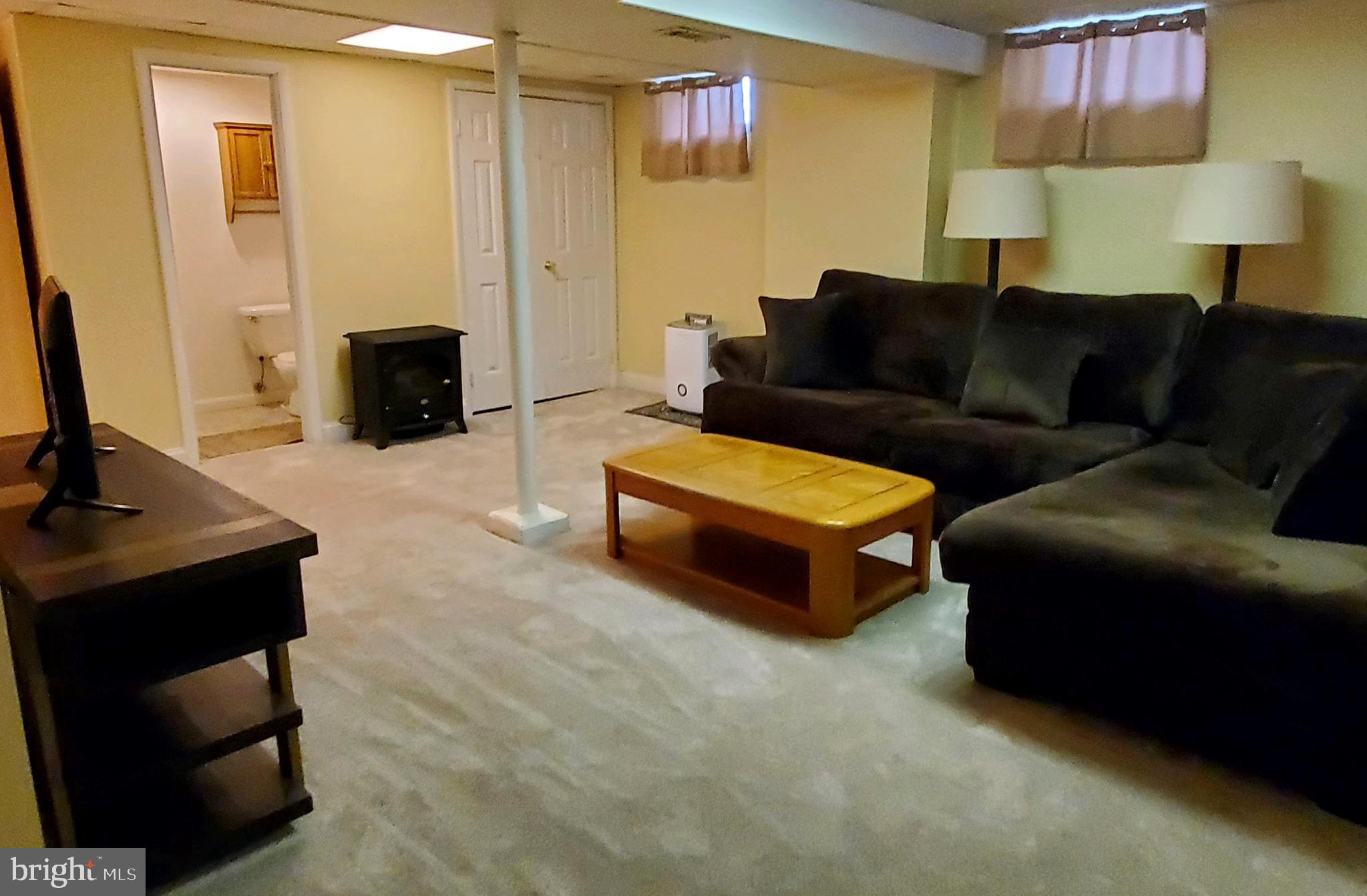 316 Queen Street Frederick, MD 21701 - Photo 24 of 28 Recreation room with half bath & closet