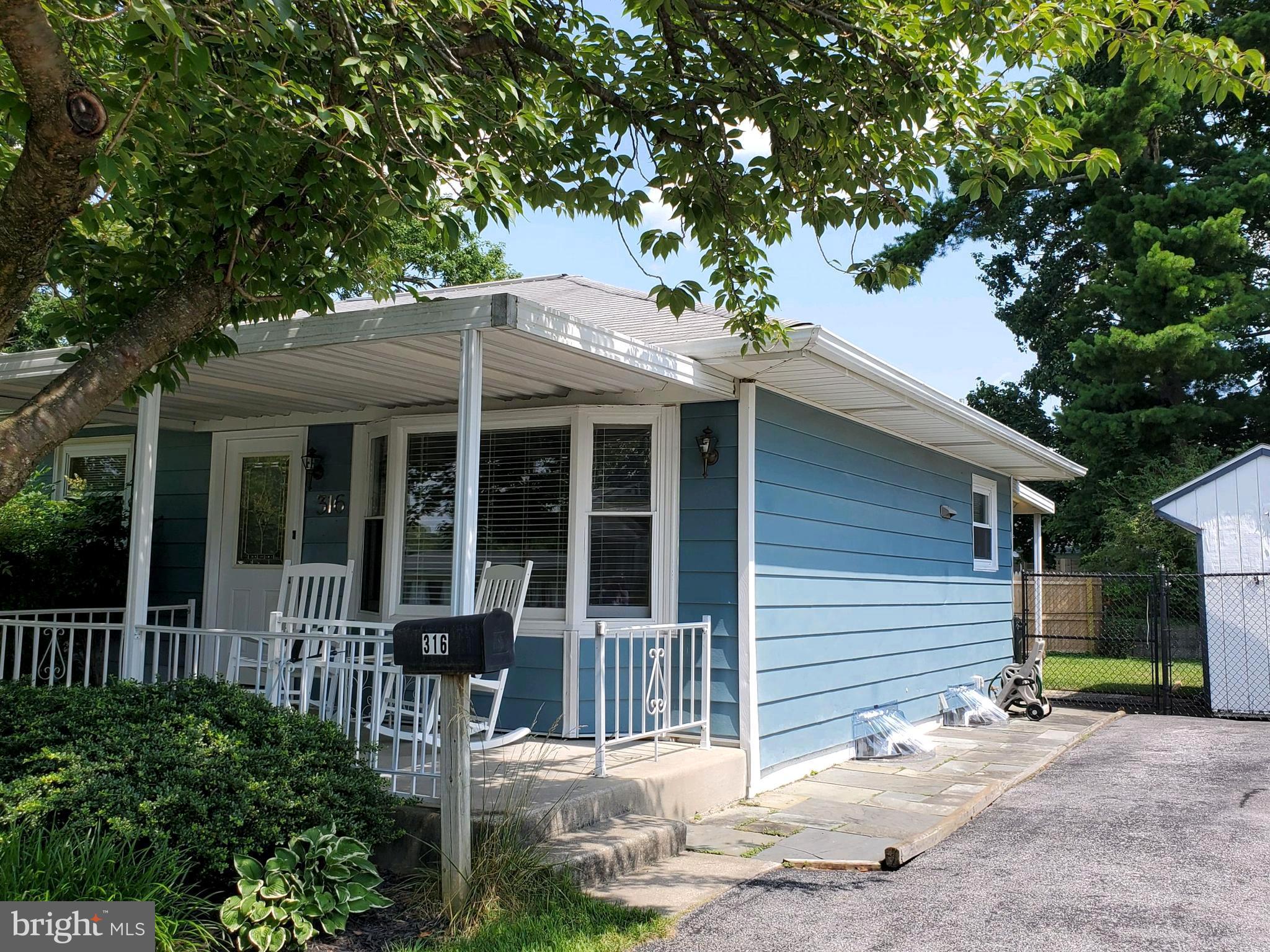 316 Queen Street Frederick, MD 21701 - Photo 4 of 28 Front porch/driveway to the right