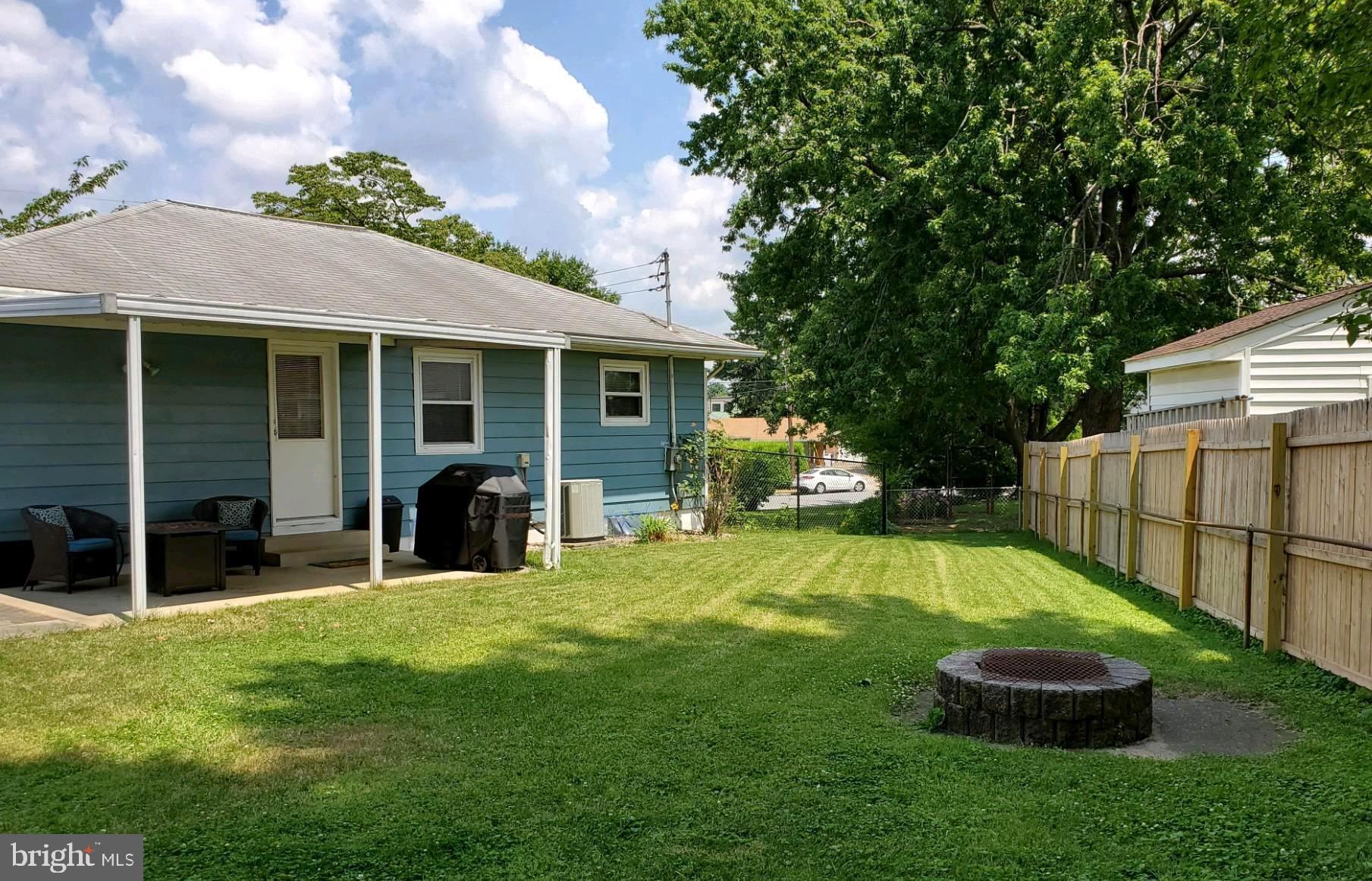 316 Queen Street Frederick, MD 21701 - Photo 8 of 28 Rear, fenced yard with firepit
