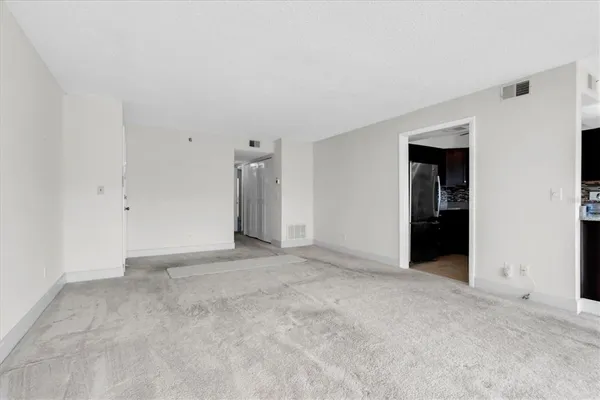 an empty room with an entryway