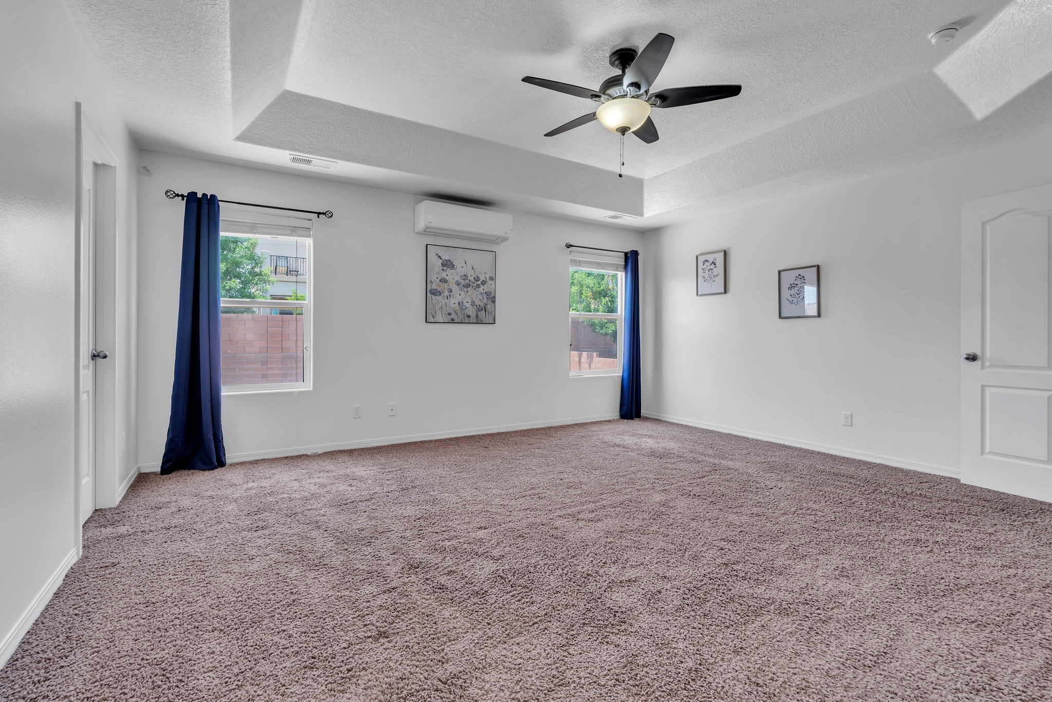 6914 Wrangell Loop Northeast Rio Rancho, NM 87144 - Photo 28 of 61 Primary Bedroom