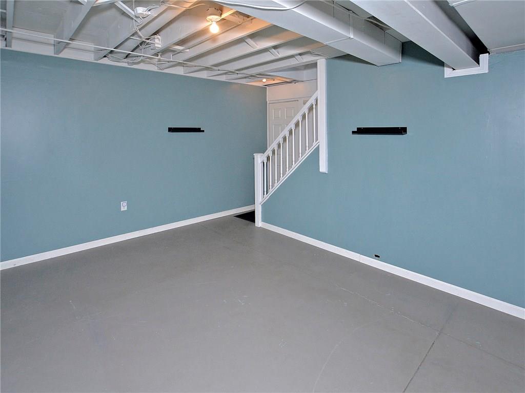 79 Rustic Ridge Drive Pittsburgh, PA 15239 - Photo 21 of 25 Partially finished gameroom - Perfect size for your "mancave," exercise room, play room, or office.