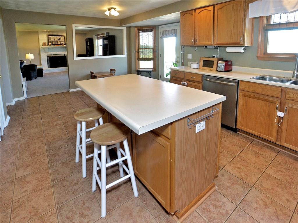 79 Rustic Ridge Drive Pittsburgh, PA 15239 - Photo 5 of 25 Very spacious kitchen with a walk-out bay and kitchen island with cabinets.