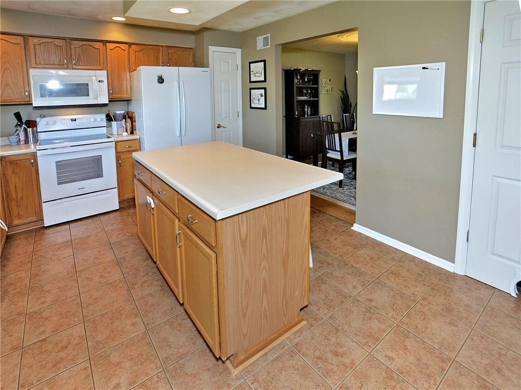 79 Rustic Ridge Drive Pittsburgh, PA 15239 - Photo 7 of 25 Ceramic tile flooring throughout kitchen.