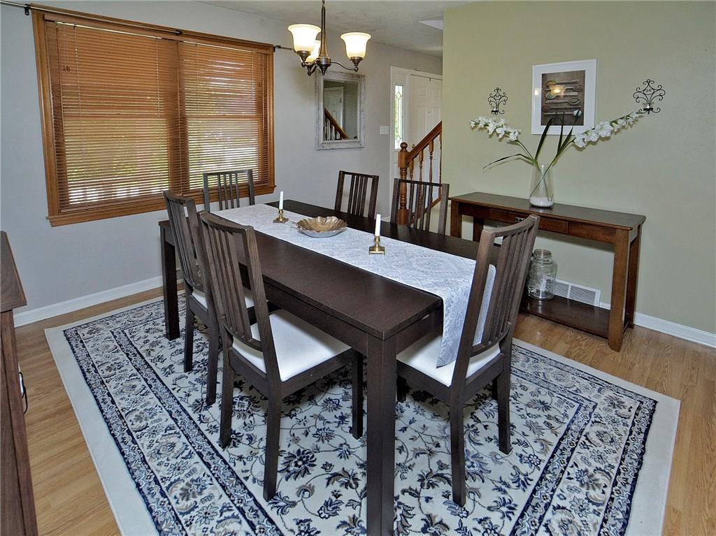 79 Rustic Ridge Drive Pittsburgh, PA 15239 - Photo 10 of 25 Nicely sized dining room with laminate flooring.