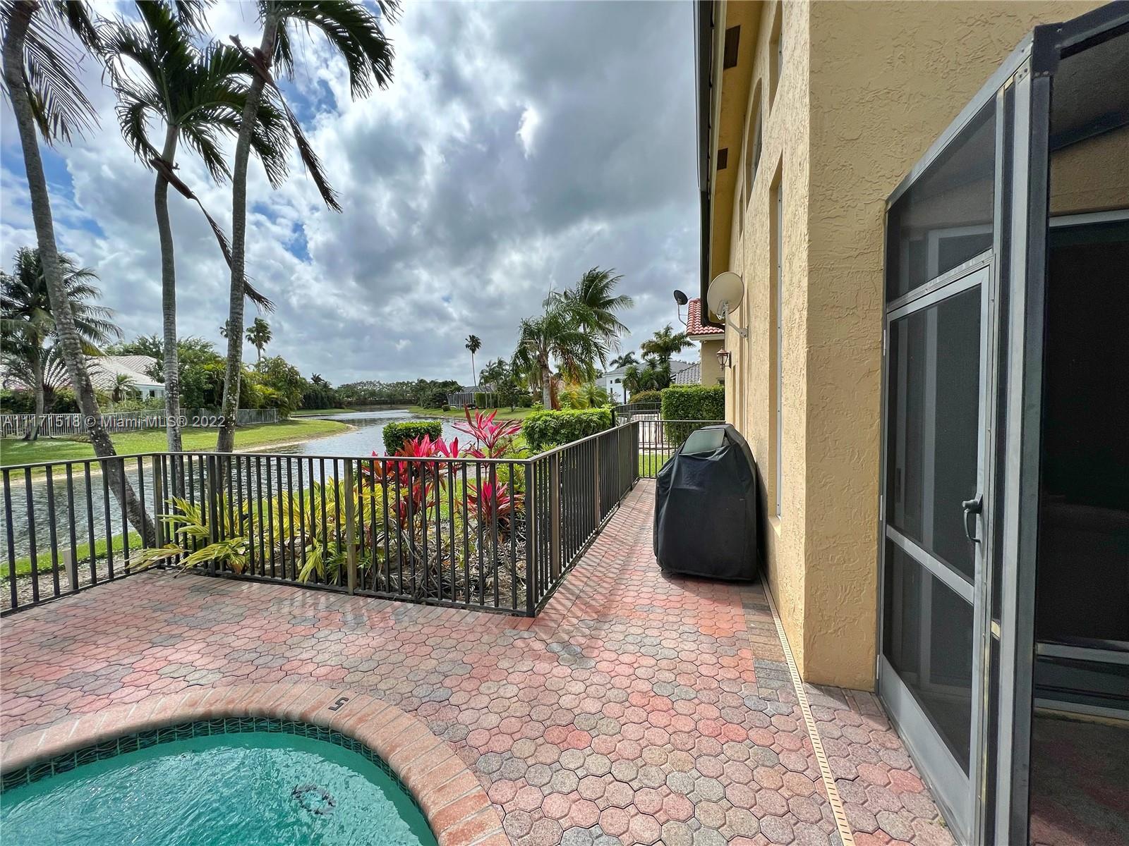 20022 Ocean Key Drive Boca Raton, FL 33498 - Photo 18 of 39 Lake Views from Swimming Pool