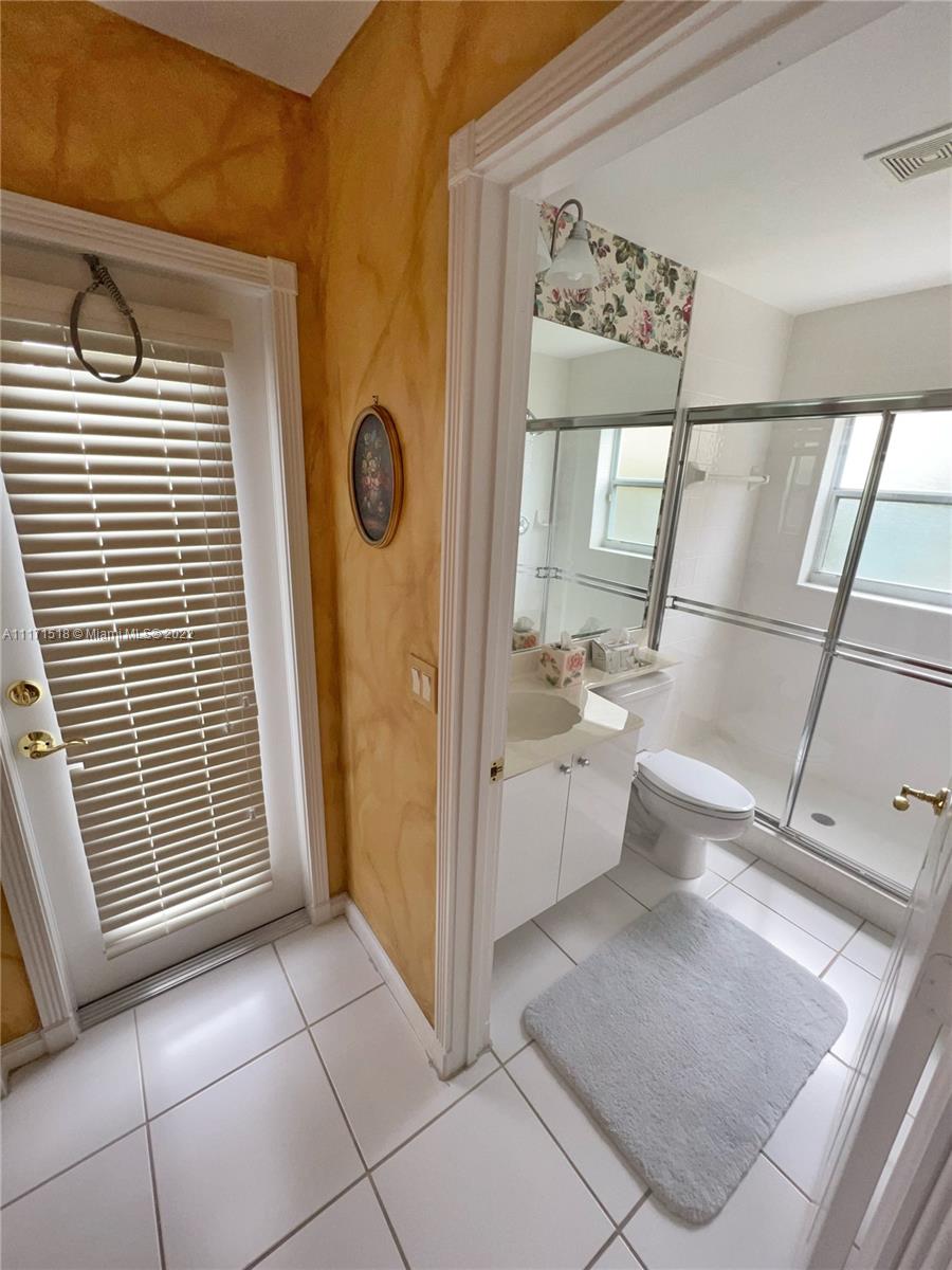 20022 Ocean Key Drive Boca Raton, FL 33498 - Photo 19 of 39 Guest Bath / Cabana Entrance