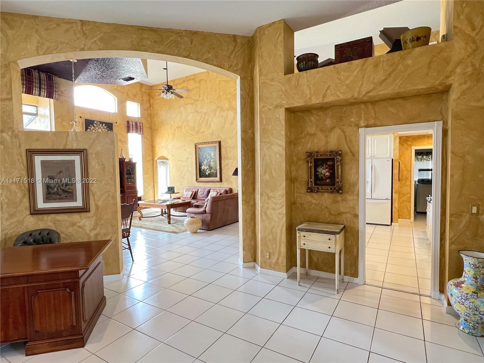 20022 Ocean Key Drive Boca Raton, FL 33498 - Photo 2 of 39 Living Room - Open Floor Plan flows into Kitchen and Family