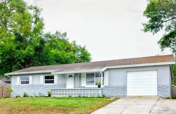 a view of a house with a swimming pool