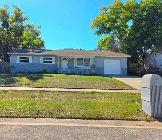 a view of a house with a swimming pool