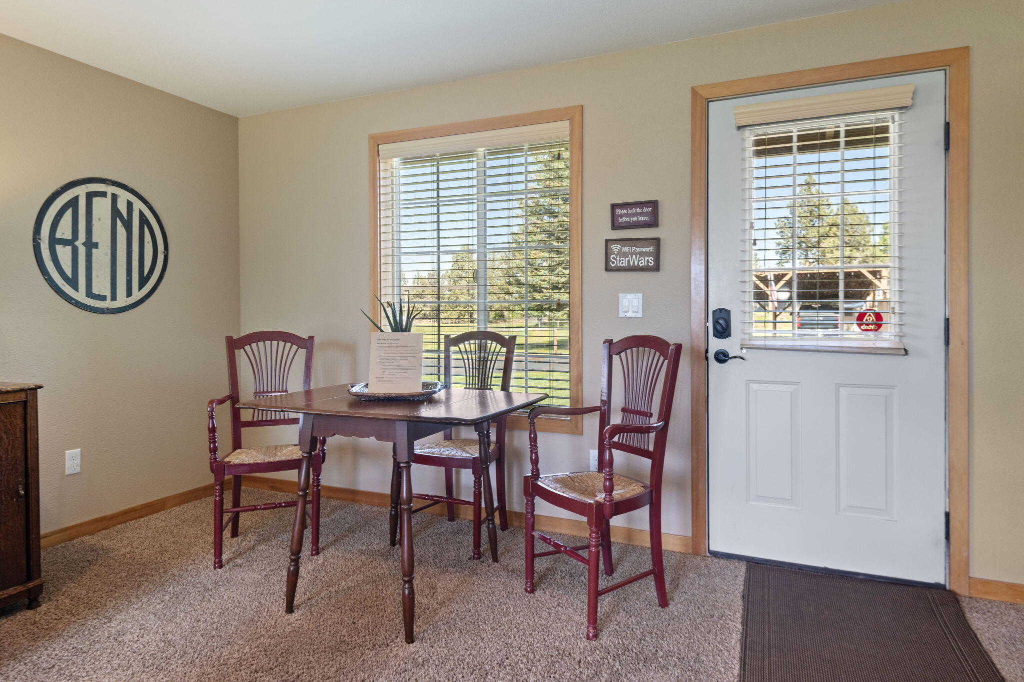 22539 Martee Lane Bend, OR 97701 - Photo 22 of 54 a dining room with furniture and window