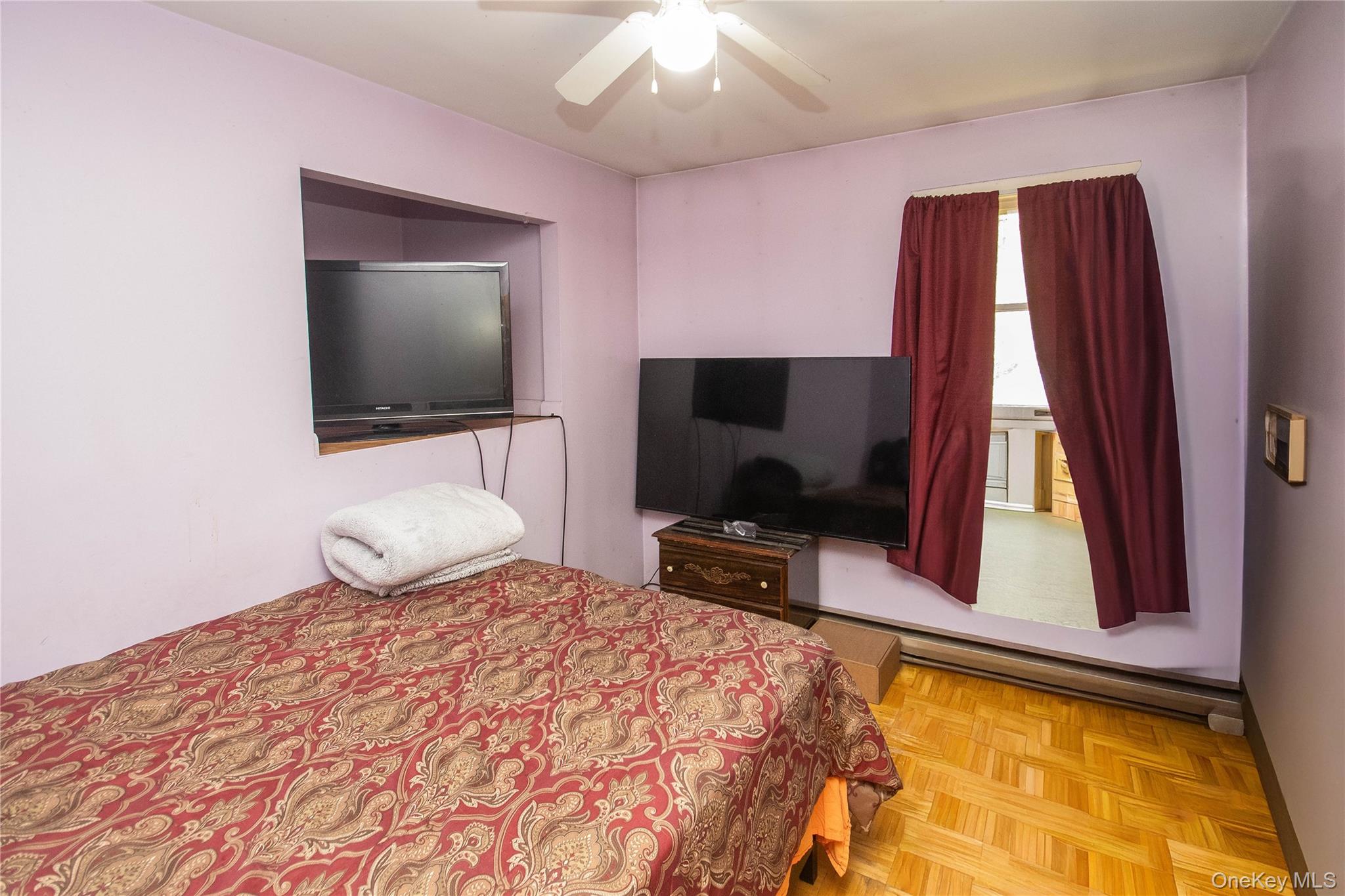 20 Valley Road Forestburgh, NY 12777 - Photo 18 of 38 Bedroom featuring ceiling fan and baseboard heating