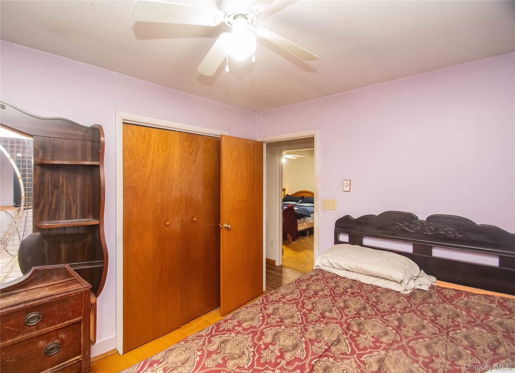 20 Valley Road Forestburgh, NY 12777 - Photo 19 of 38 Bedroom with ceiling fan, light wood-type flooring, and a closet
