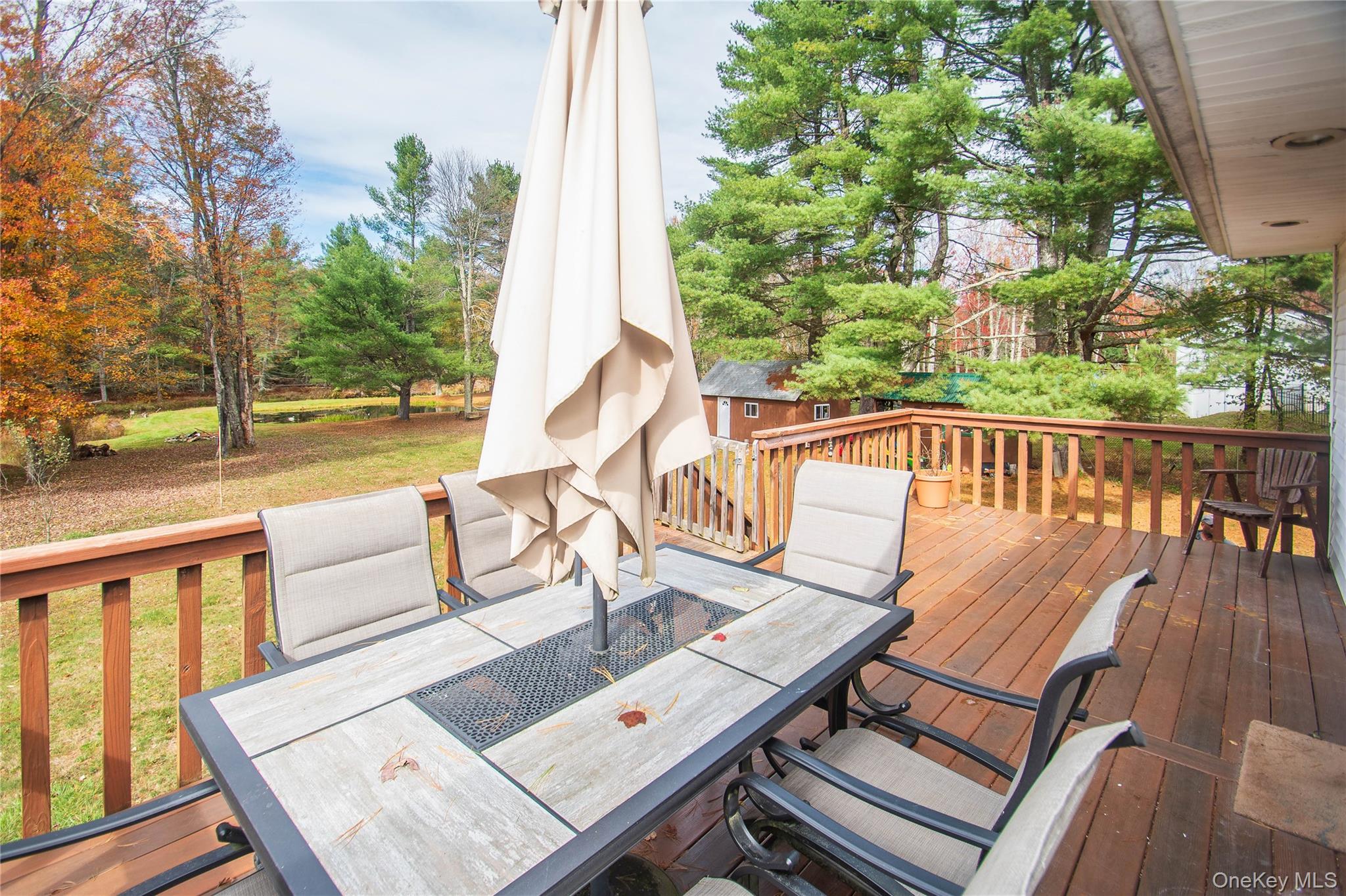 20 Valley Road Forestburgh, NY 12777 - Photo 31 of 38 Wooden terrace with outdoor dining area