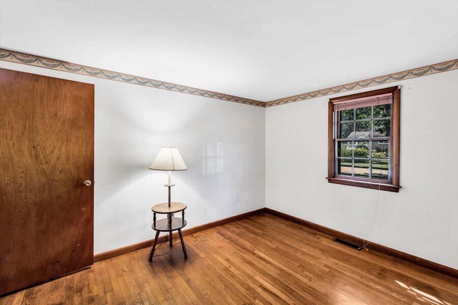 18 Pamet Road West Yarmouth, MA 02673 - Photo 15 of 23 a room with a window and wooden floor