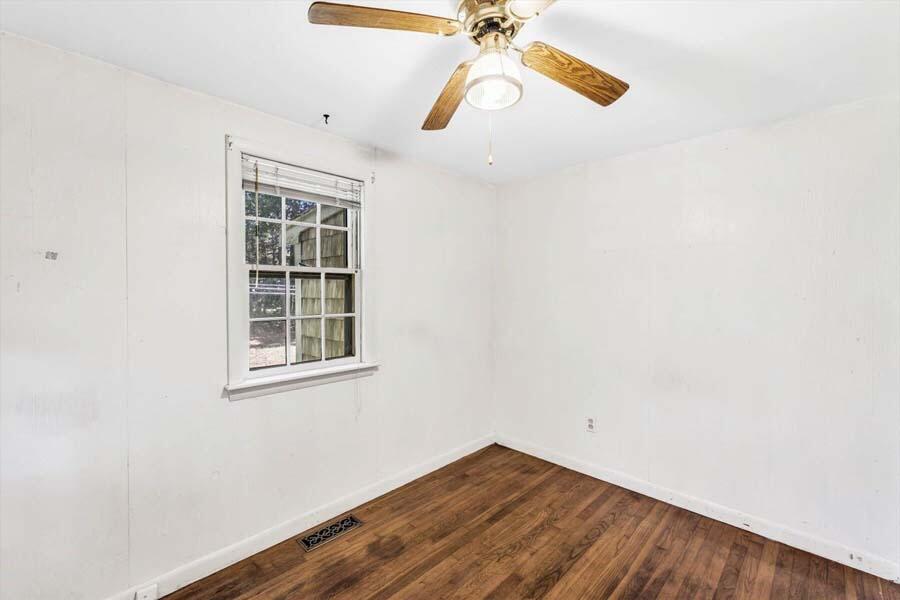 18 Pamet Road West Yarmouth, MA 02673 - Photo 17 of 23 an empty room with windows and fan