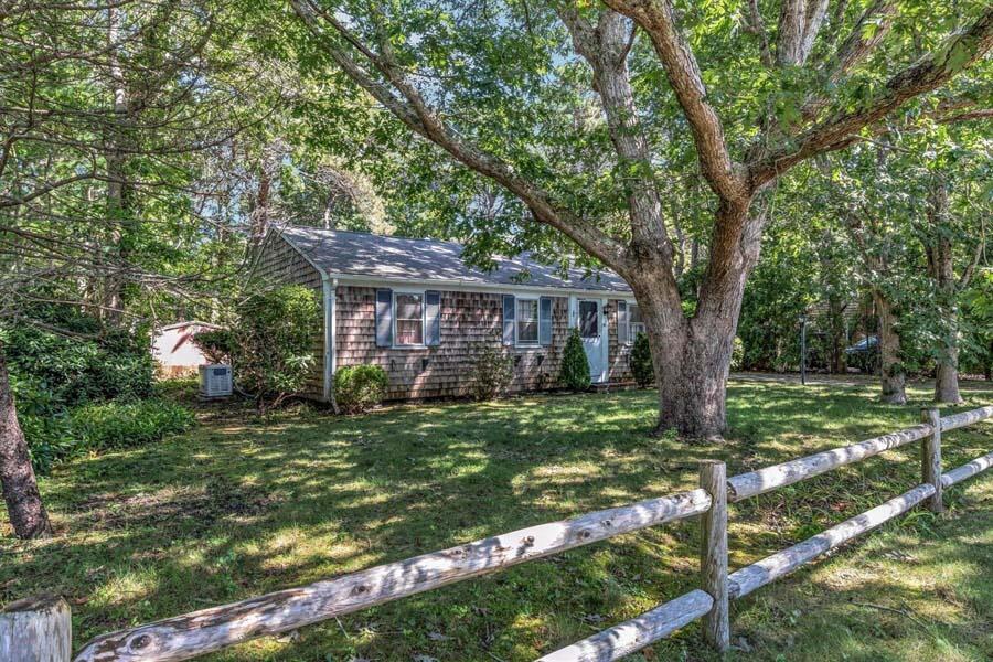 18 Pamet Road West Yarmouth, MA 02673 - Photo 2 of 23 a view of a house with a yard