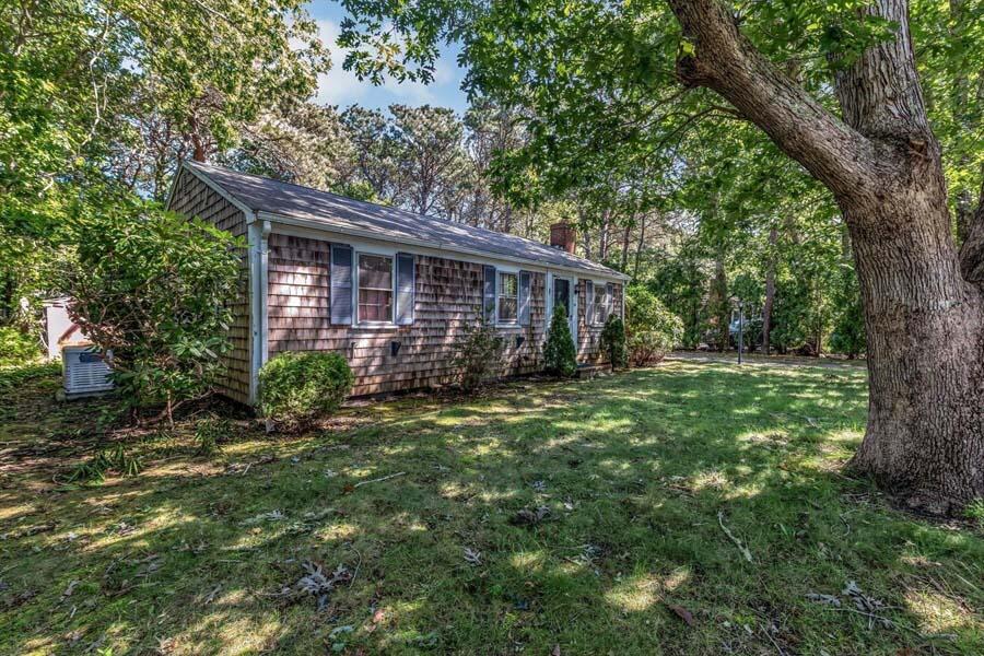 18 Pamet Road West Yarmouth, MA 02673 - Photo 4 of 23 a view of a house with a yard