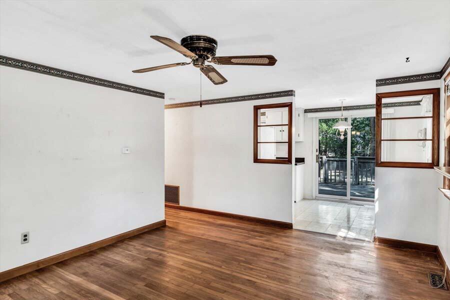 18 Pamet Road West Yarmouth, MA 02673 - Photo 8 of 23 a view of empty room with wooden floor and fan