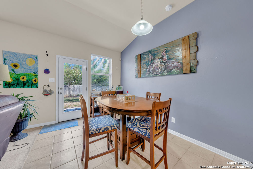 10222 Shawnee Converse, TX 78109 - Photo 11 of 28 a dining room with furniture and window