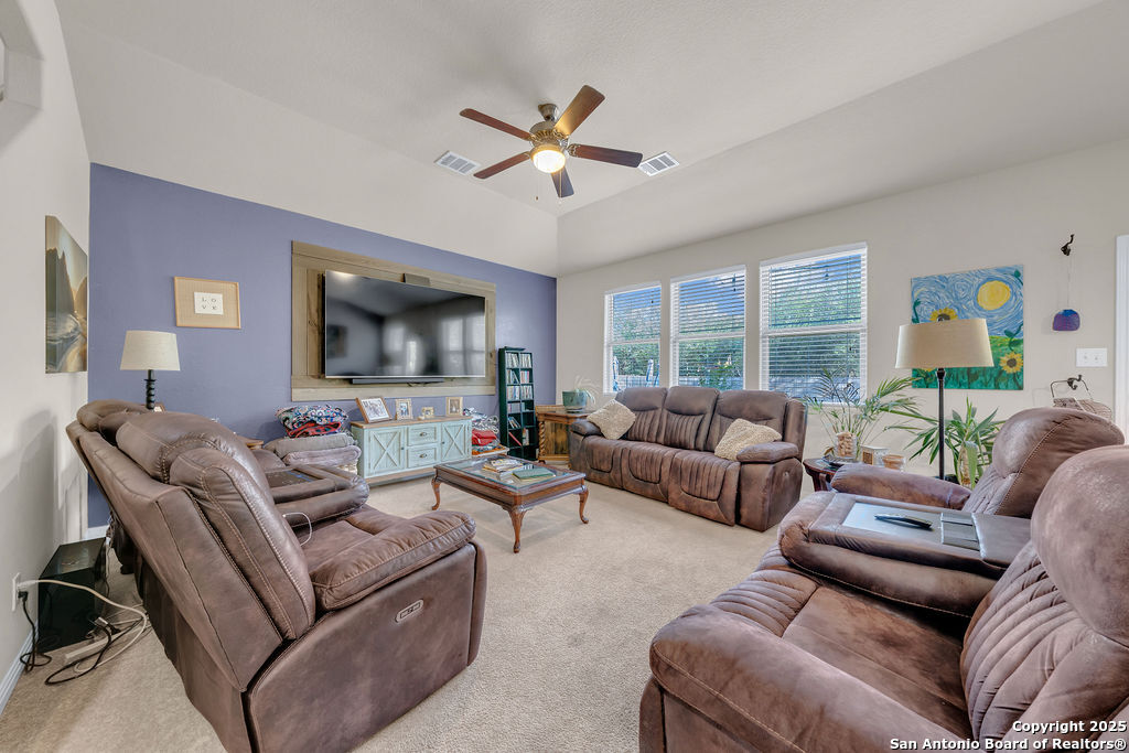 10222 Shawnee Converse, TX 78109 - Photo 10 of 28 a living room with furniture and a flat screen tv
