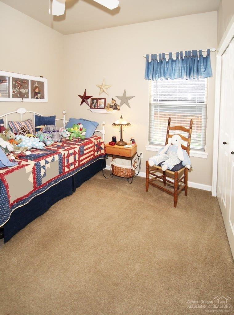 20730 Beaumont Drive Bend, OR 97701 - Photo 15 of 19 Bedroom #2. Ceiling fan and large doubl