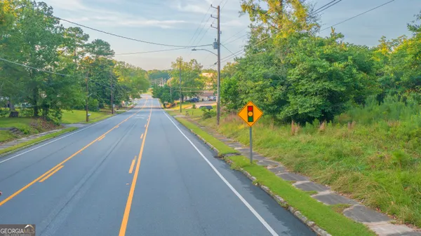 a view of balcony with yard