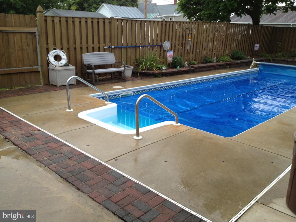 109 East 2nd Avenue Ranson, WV 25438 - Photo 18 of 31 Beautiful inground pool in fenced yard