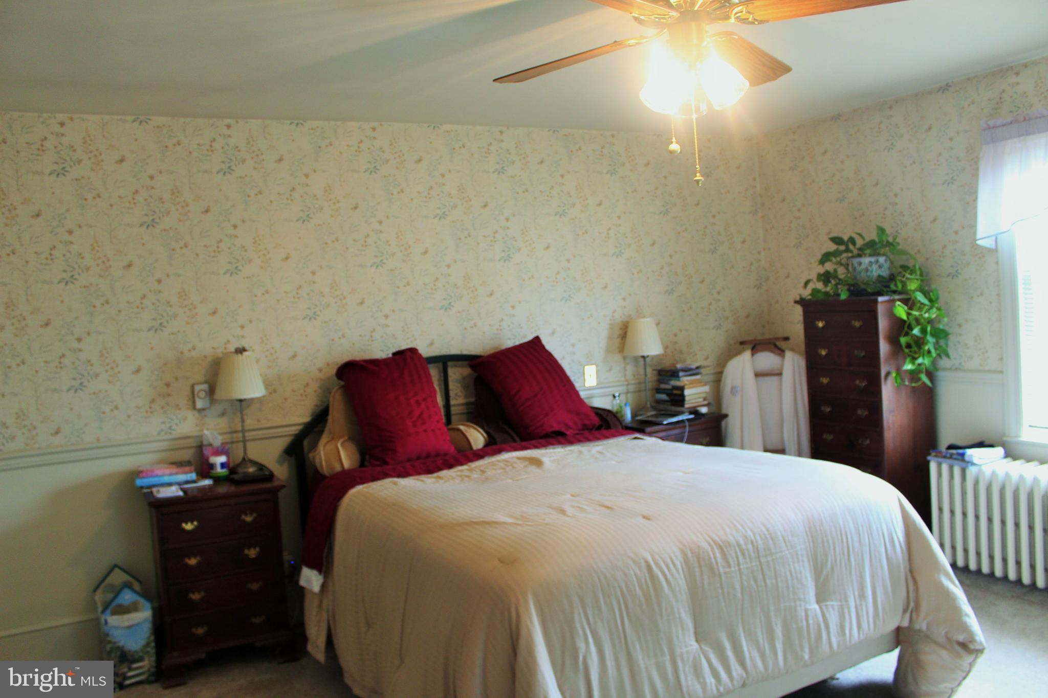 109 East 2nd Avenue Ranson, WV 25438 - Photo 19 of 31 MBR has new carpeting, walk-in closet and fan
