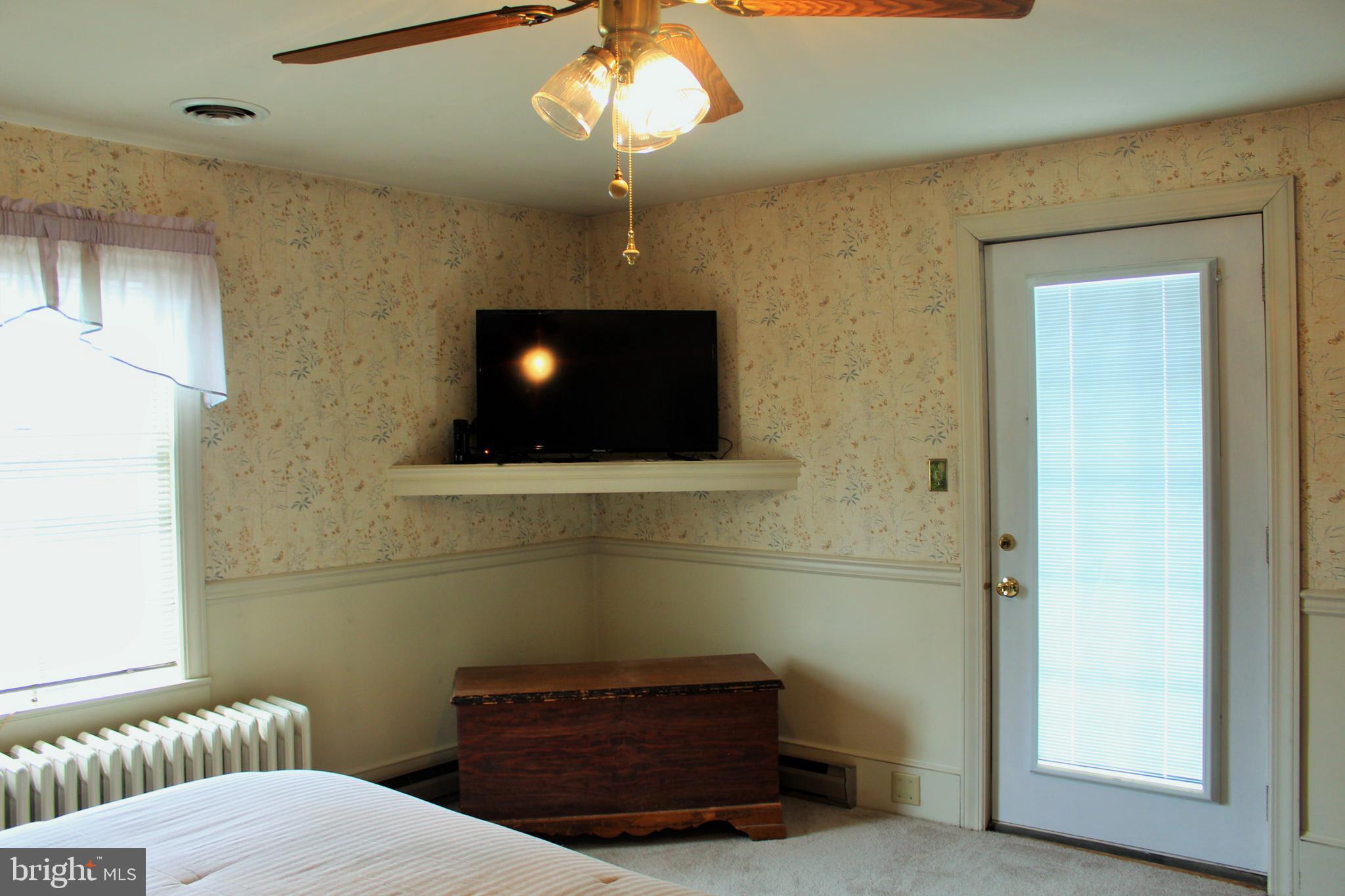 109 East 2nd Avenue Ranson, WV 25438 - Photo 20 of 31 Master bedroom deck overlooking yard
