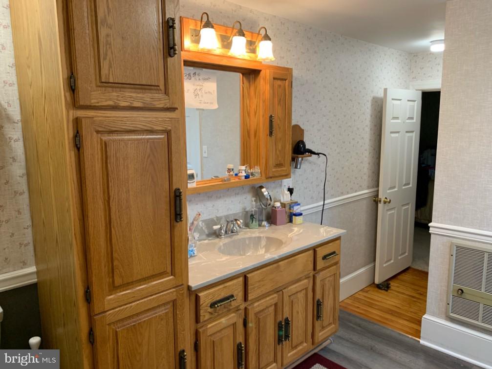 109 East 2nd Avenue Ranson, WV 25438 - Photo 21 of 31 Master bath boasts vinyl plank flooring