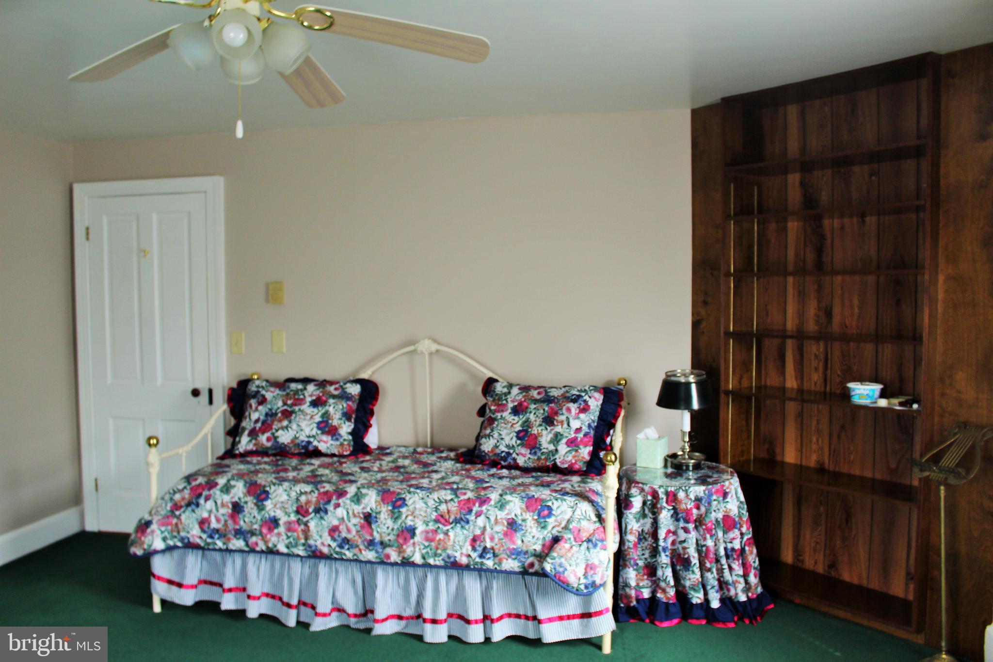 109 East 2nd Avenue Ranson, WV 25438 - Photo 23 of 31 Bedroom #2 with built-ins and ceiling fan