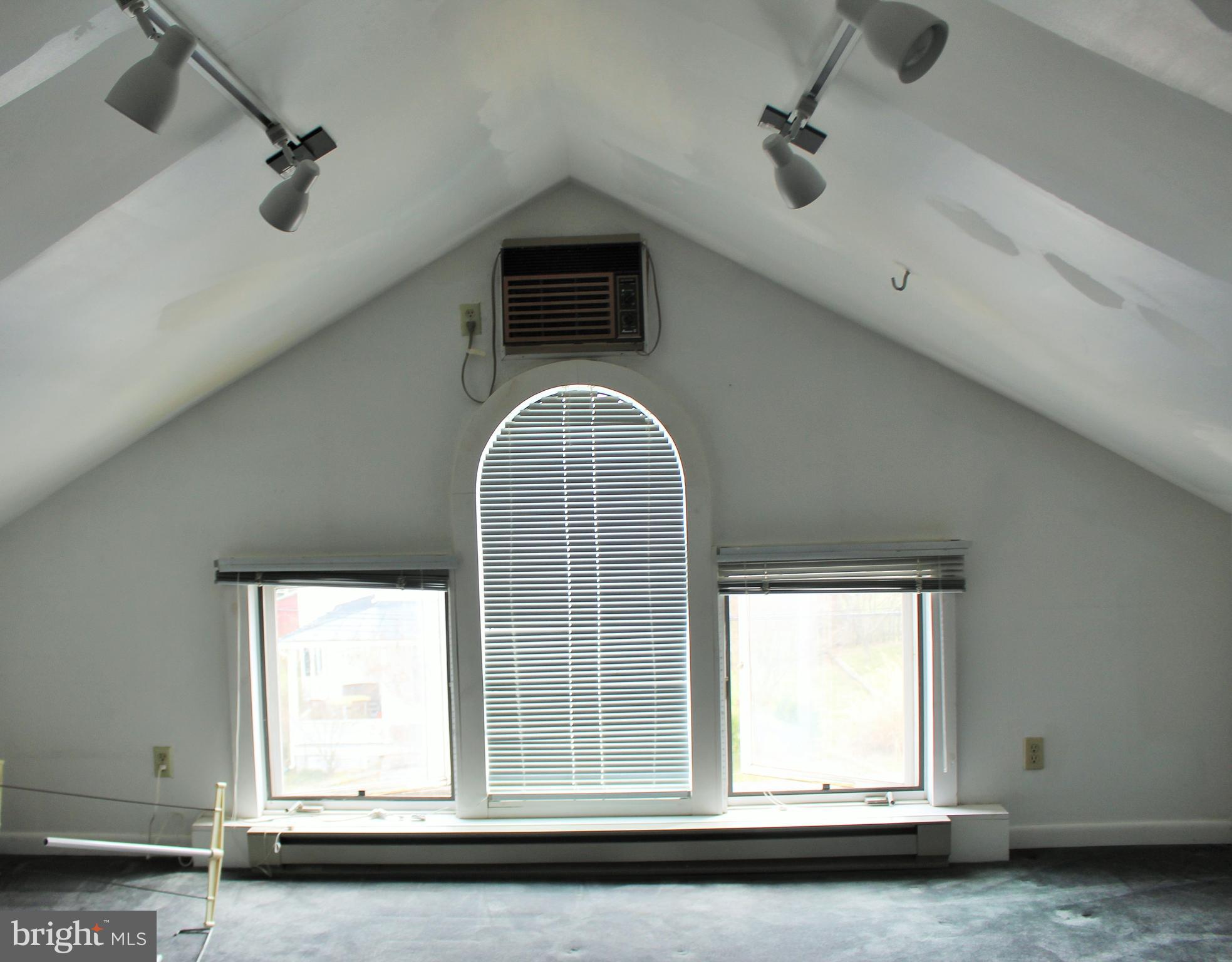 109 East 2nd Avenue Ranson, WV 25438 - Photo 27 of 31 Half of attic is finished with casement windows
