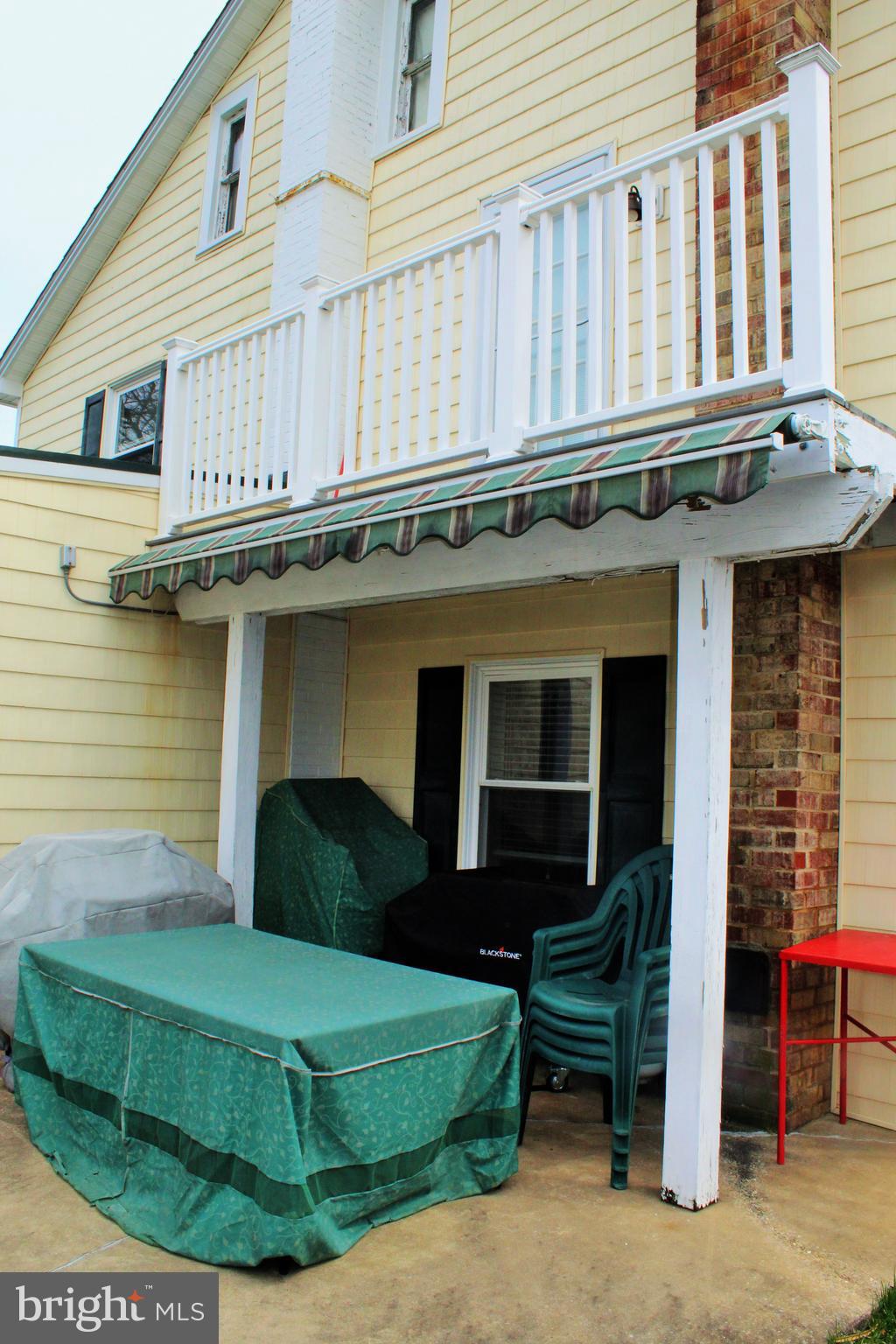 109 East 2nd Avenue Ranson, WV 25438 - Photo 29 of 31 Rear view shows patio and awning
