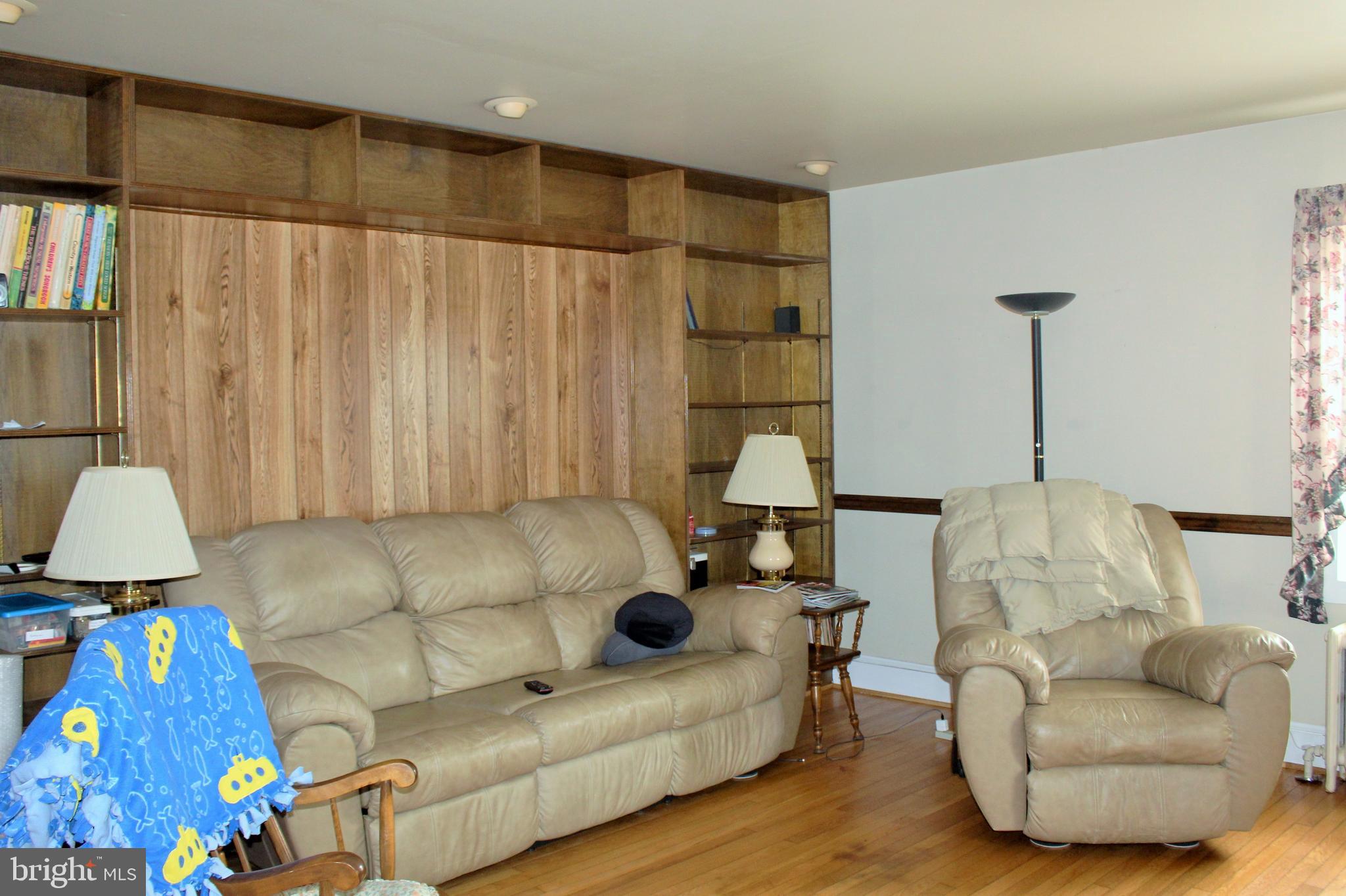 109 East 2nd Avenue Ranson, WV 25438 - Photo 7 of 31 Living room with hardwood flooring