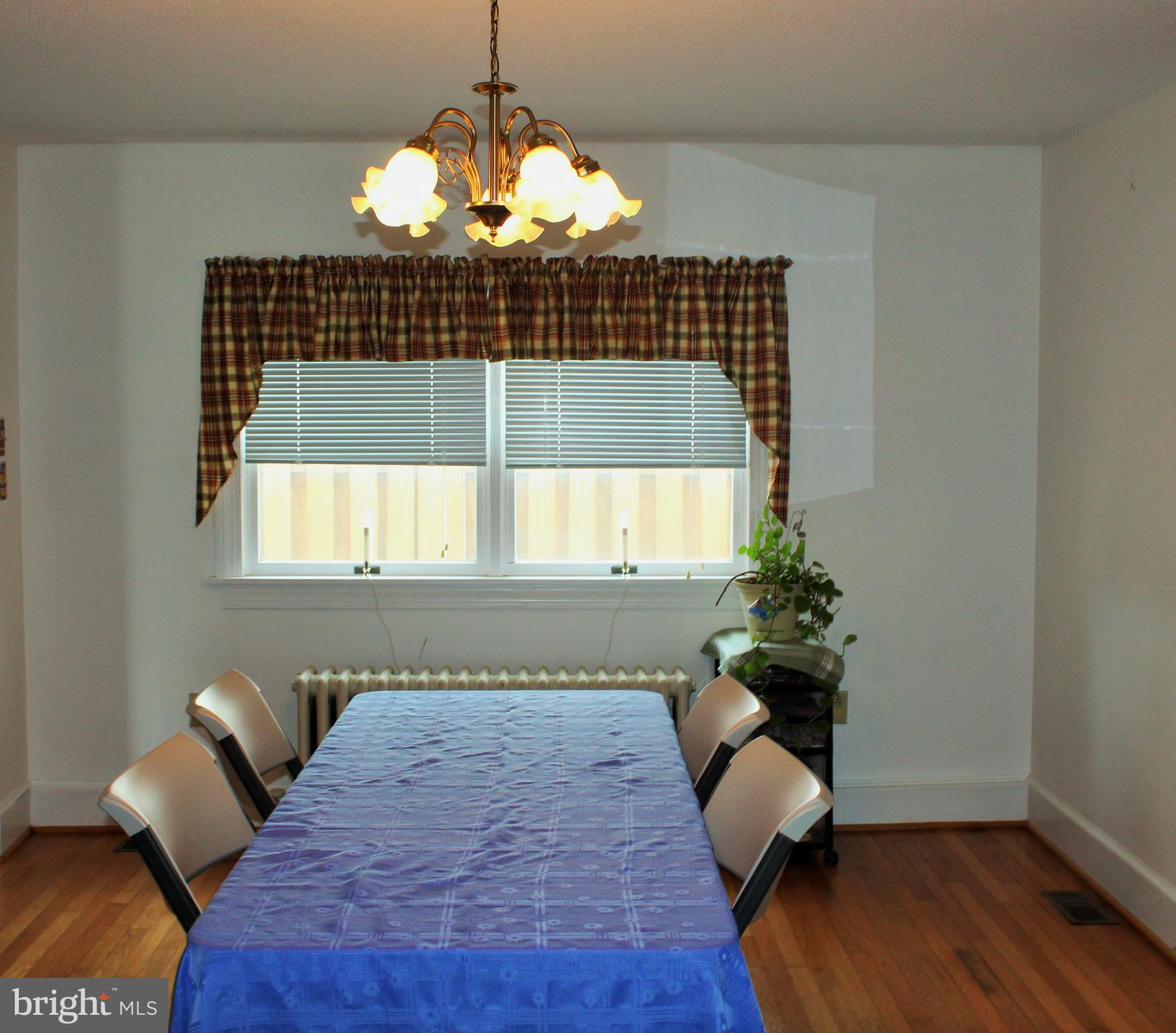 109 East 2nd Avenue Ranson, WV 25438 - Photo 10 of 31 15 x 12 dining room has hardwood flooring