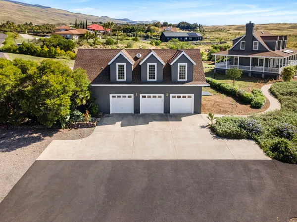 a view of a house with a garage