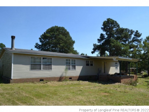 890 Maynard Lake Road Godwin, NC 28344 - Photo 2 of 7 a view of outdoor space yard and front view of a house