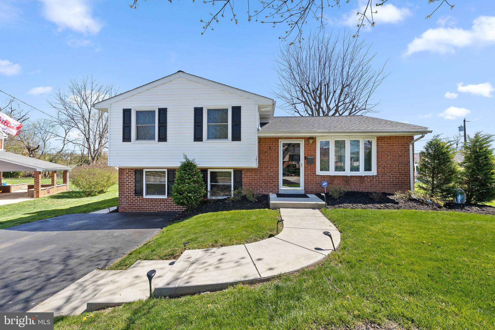 1411 Sandwood Road Conshohocken, PA 19428 - Photo 1 of 33 Beautiful path to the newer front door