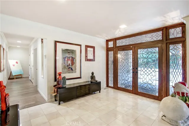 a view of a livingroom with furniture and windows