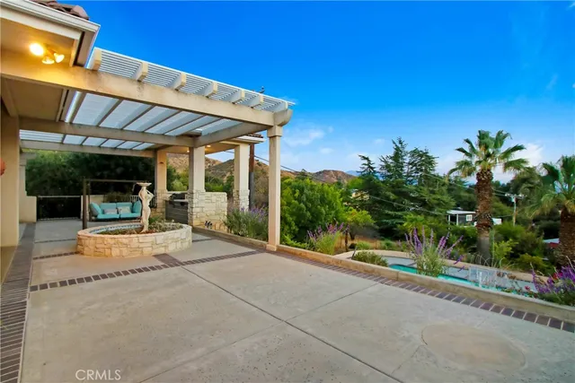 a view of a swimming pool with a chairs