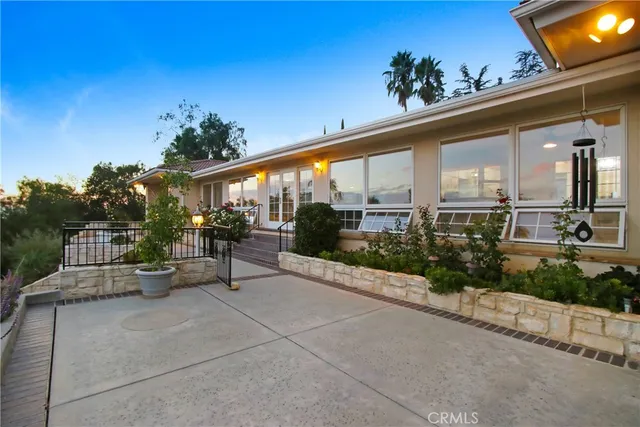 a view of a fence in front of a house