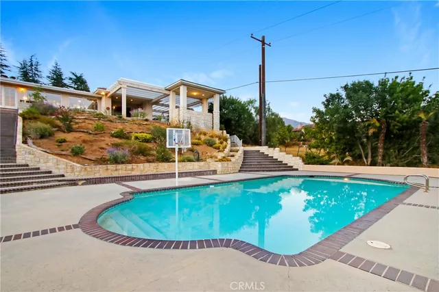 an aerial view of a house with a garden
