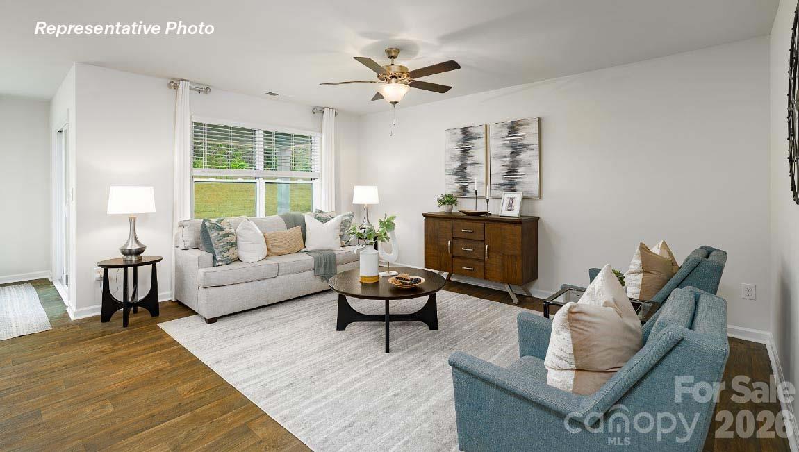 4552 Harris Elliot Road Lincolnton, NC 28092 - Photo 11 of 31 a living room with furniture and a fireplace