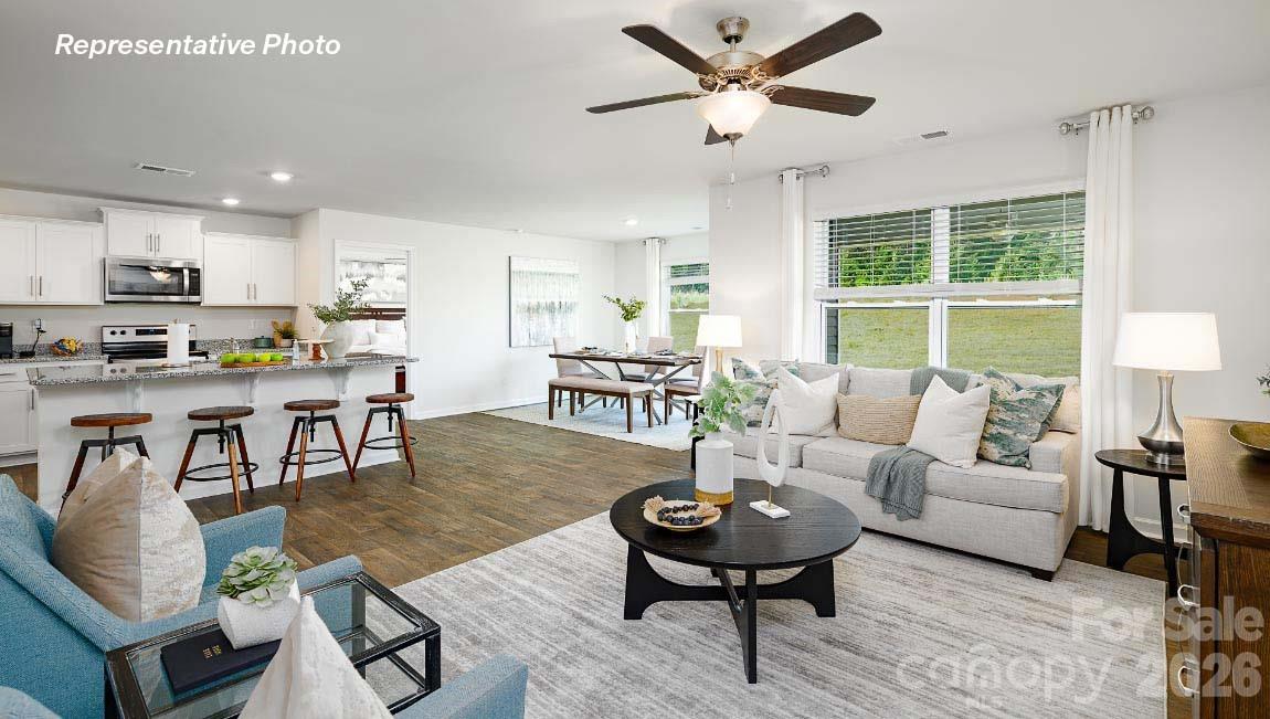 4552 Harris Elliot Road Lincolnton, NC 28092 - Photo 12 of 31 a living room with furniture and a large window