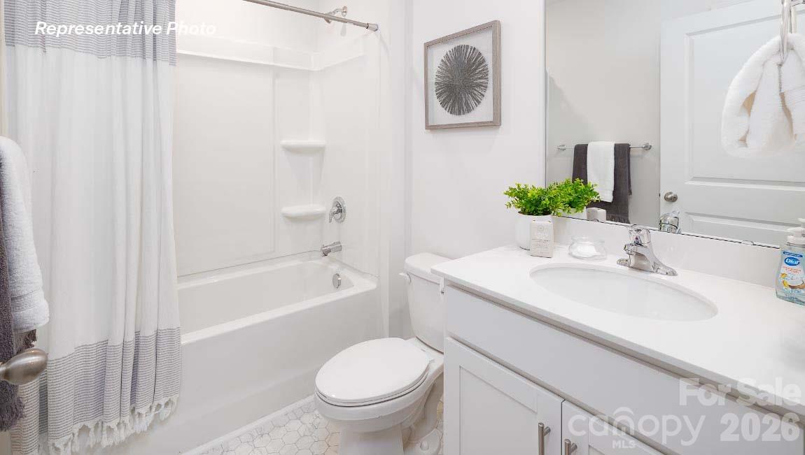 4552 Harris Elliot Road Lincolnton, NC 28092 - Photo 22 of 31 a bathroom with a sink toilet and shower