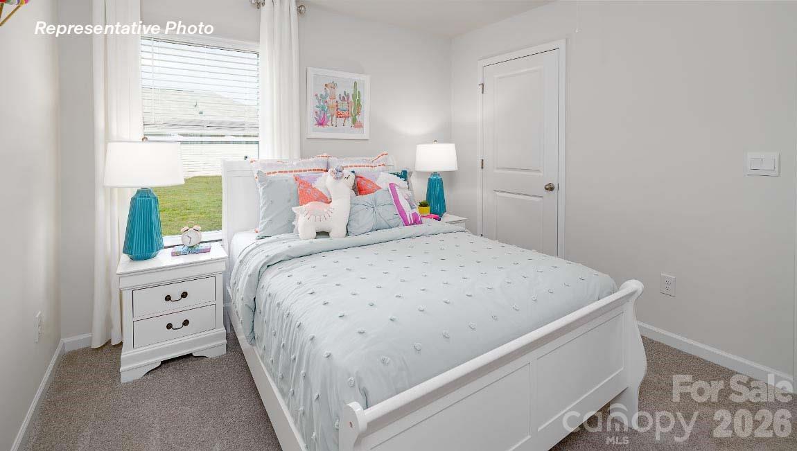 4552 Harris Elliot Road Lincolnton, NC 28092 - Photo 24 of 31 a bedroom with a bed and a window