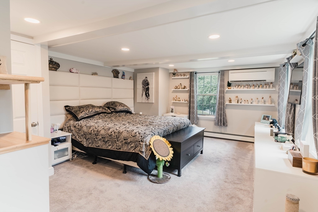 2 Kelsey Road Boxford, MA 01921 - Photo 11 of 42 a bedroom with a bed and a large window