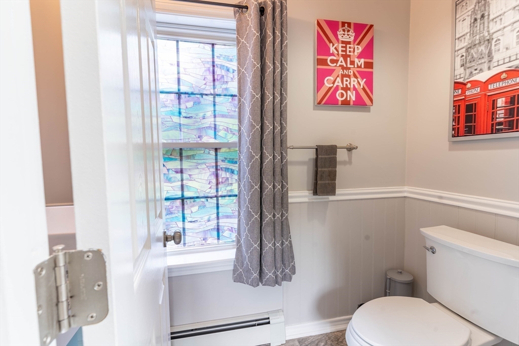 2 Kelsey Road Boxford, MA 01921 - Photo 22 of 42 a bathroom with a toilet and a shower curtain